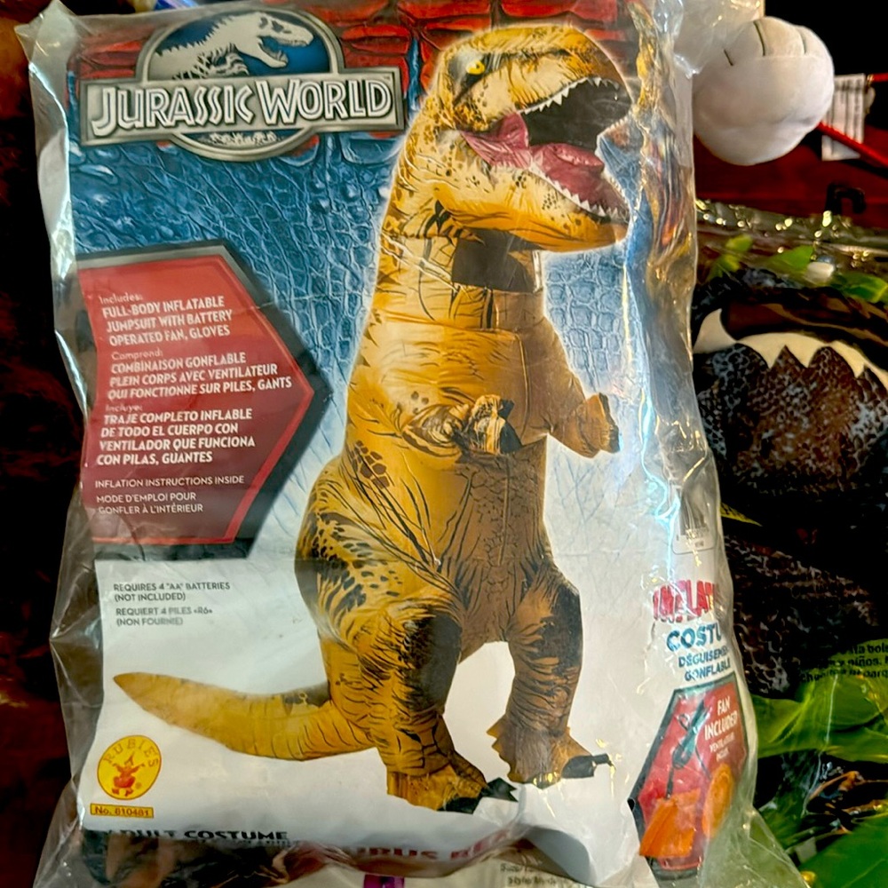 Adult one size fits most. Trex costume worn once
